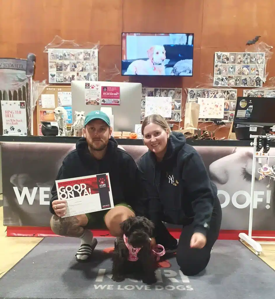 Jester and owners who just completed the Kuri puppy training course