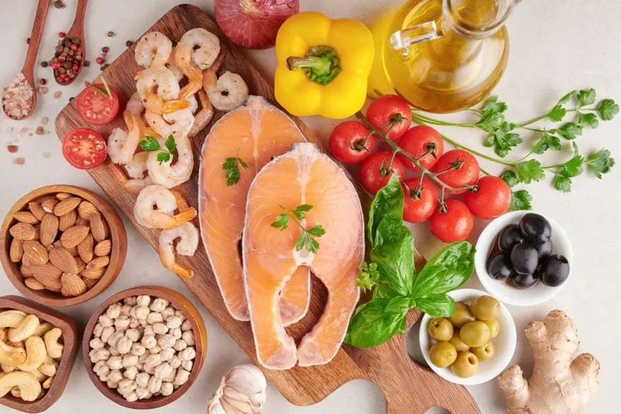 a range of foods on a cutting board